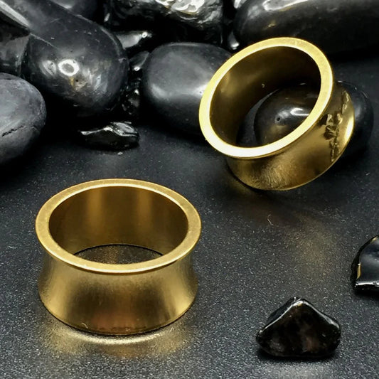 Thick Polished Gold Steel Tunnels with a gleaming finish.